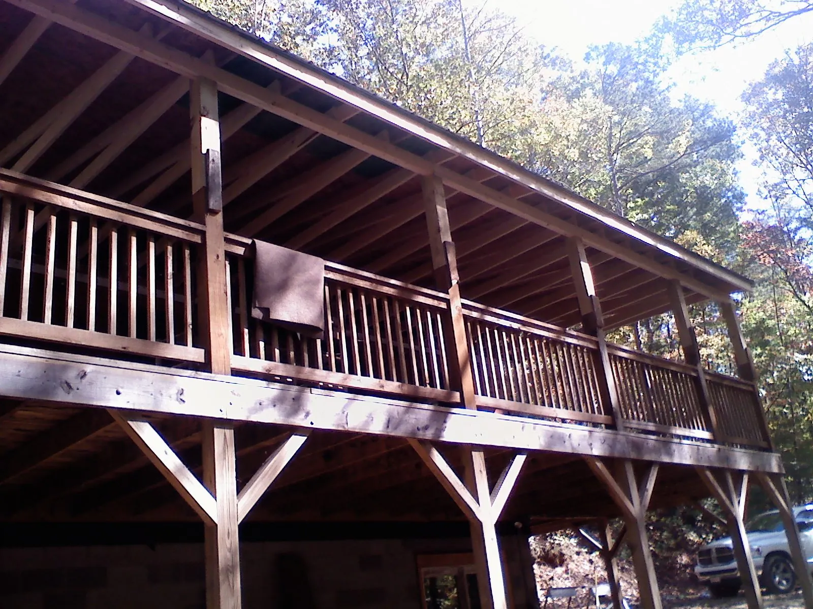 Timber framing under a new elevated porch and deck — Roof Leak Repair in Pleasant Shade by Roofing Brothers